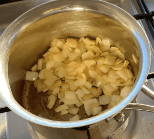 A saucepan of diced onions