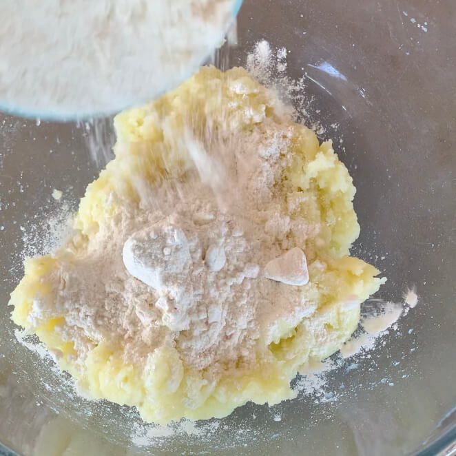 Adding flour to potato