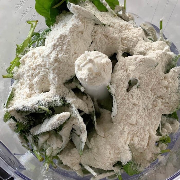 spinach, flour and salt in a food processor