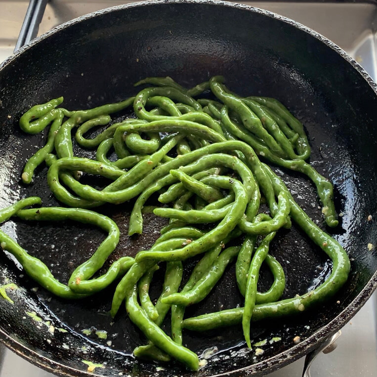 Bright green pici pasta