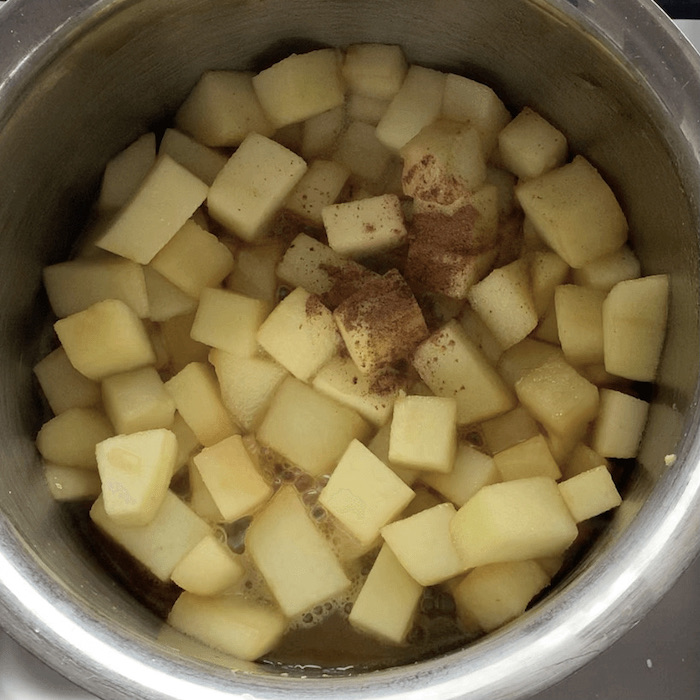 Apple pie ingredients in a pan